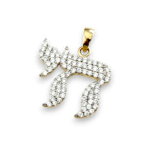 Gold and diamond chai pendant on a white background