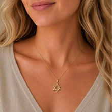 Woman Wearing 14K Gold Diamond Star of David Necklace