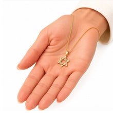 14K Gold Diamond Star of David Necklace in Hand