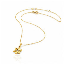 Gold necklace with a star-shaped pendant on a white background