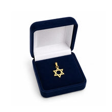 Gold Star of David pendant in a blue velvet box on a white background
