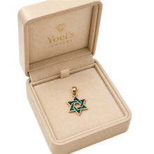Gold and blue star-shaped pendant in a 'Yoel's Jewelry' box on a white background