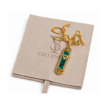 Gold mezuzah pendant Israel with natural Eilat stone symbolic Jewish jewelry