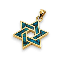 Gold pendant with blue stone inlay on a white background