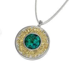A 925 silver gold Jerusalem pendant set with Eilat stone, featuring a 3D skyline Jerusalem pendant with a green and blue stone in the center, surrounded by yellow gold and silver beads along the edge.