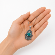 925 sterling silver Hamsa pendant with Eilat stone on woman hand, handmade filigree Judaica necklace