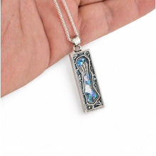 Roman Glass Silver Mezuzah Pendant on hand