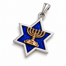 Silver Star of David pendant with blue enamel and 9K gold Menorah on white background