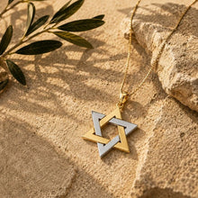 Gold Star of David Pendant on Stone Background