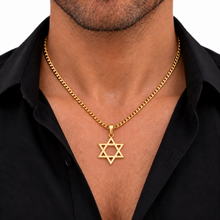 men  wearings 14k gold star of david domed 