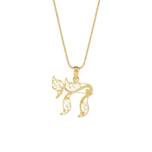 Gold necklace with a decorative pendant on a white background