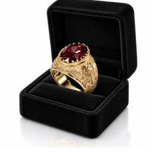 Luxury Jerusalem garnet ring displayed in an open black velvet jewelry box