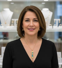 Woman wearing 14k gold roman glass mezuzah judaica pendant from Israel Yoels Jewelry 