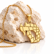 Side angle of 14K yellow gold Chai pendant featuring polished Western Wall brick pattern