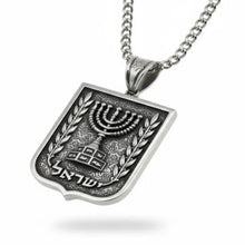Silver pendant with Menorah design on a white background