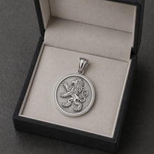 Silver  lion  of judah pendant in an open jewelry box 