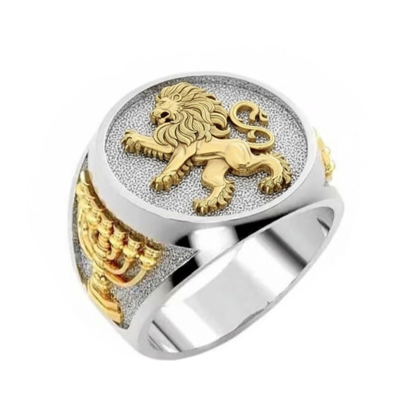 Silver and gold ring with a lion of Judah  emblem on a white background