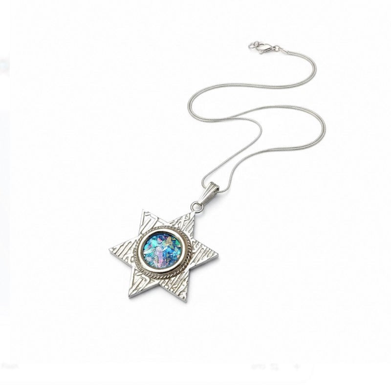 Silver necklace with a star-shaped pendant on a white background