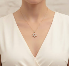 gold star of david set with diamonds on a women 
