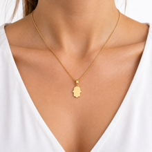14K yellow gold Hamsa pendant on women neck 