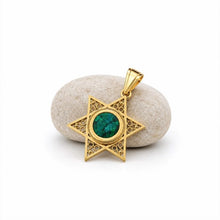 A gold Star of David  set with Eilat stone from Israel 