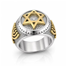 Silver and gold ring with Star of David design on a white background