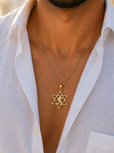 man wearing 14k gold Star of David necklace with lion symbol jewish men jewelry