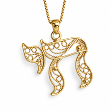  gold chai pendant  with a chain 