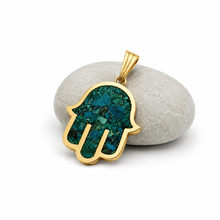 eilat stone  hamsa in 14k gold  on rock 