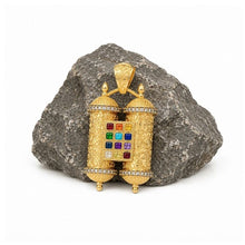 Luxury men’s 14K gold Hoshen pendant on rock 