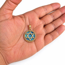gold roman glass star of david on  hand 