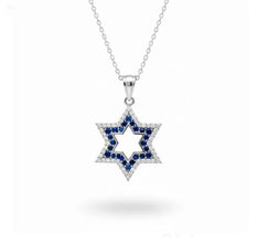Star-shaped pendant with blue stones on a white background