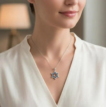 Woman wearing a star of david pendant
