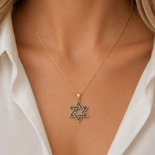 blue sapphire star of david necklace on woman