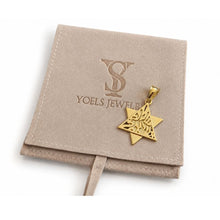 Gold star-shaped pendant on a Yoels Jewlery branded card
