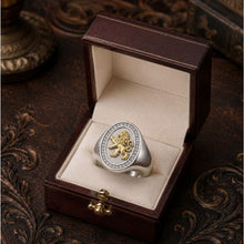 gold  lion  of judah emblem in a wooden box on an ornate surface