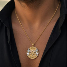 Close-up of 14K Gold Lion of Judah Star of David Pendant worn by man on gold chain