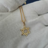 Dainty 14k Gold Star of David Necklace on Woman – Minimalist Jewish Jewelry