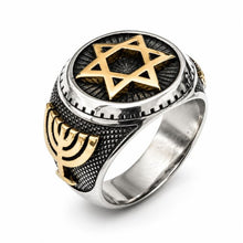 Ring with Star of David and Menorah design on a white background
