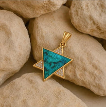 Gold Star of David Pendant with Eilat Stone on Natural Stone Background