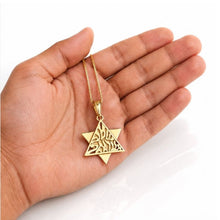 14K Gold Star of David Pendant with Shema Israel shown in hand for size reference