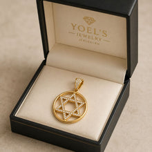 Gold pendant with star design in a 'Yoel's Jewelry' box