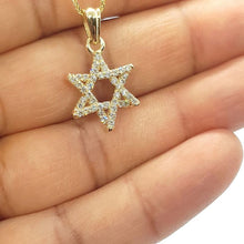 14k Gold Star of David Diamond Pendant on hand
