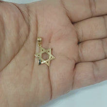 14K Yellow Gold Domed Star of David Pendant on hand