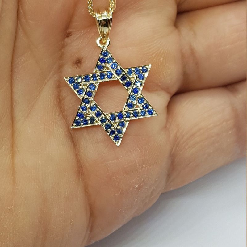 Star of David Pendant With Sapphire Stones on Hand