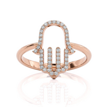 red gold hamsa ring set with diamonds